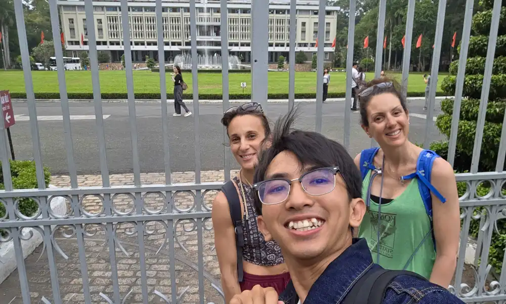 Local guide leading guests during a Ho Chi Minh City free walking tour in District 1