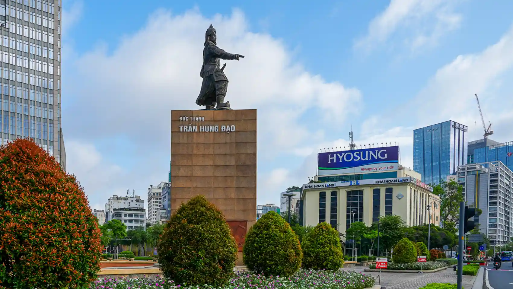 Tran Hung Dao (Trần Hưng Đạo) statue and Đức Thánh monument overlooking Me Linh Square at Bach Dang Wharf, District 1, Ho Chi Minh City